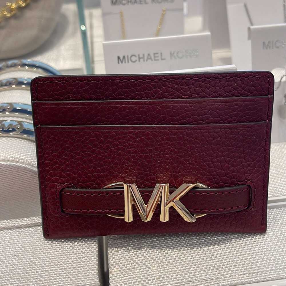 MICHAEL KORS
Reed Large Pebbled Leather Card Holder Case
Dark Cherry 
NWT - Picture 9 of 16